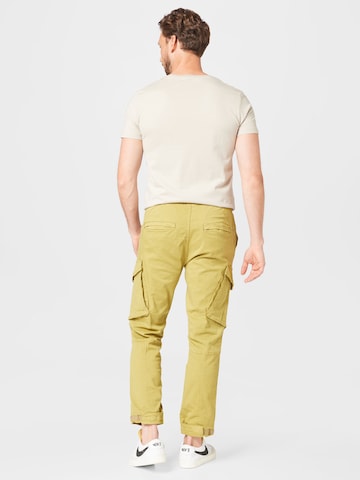 Tapered Pantaloni cu buzunare 'Callen' de la Redefined Rebel pe verde