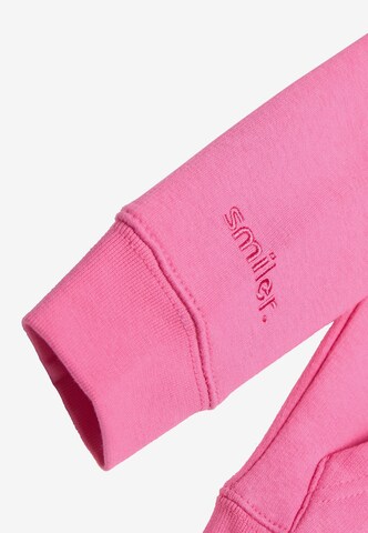 smiler. Zip-Up Hoodie in Pink