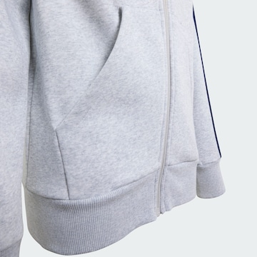 ADIDAS SPORTSWEAR - Casaco em moletão 'Essentials' em cinzento