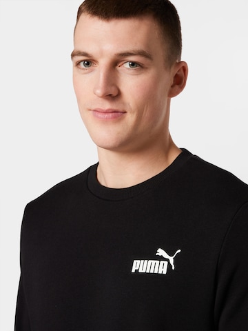 PUMA Sportovní mikina 'Essentials' – černá