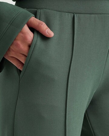 WE Fashion Loosefit Pantalon in Groen