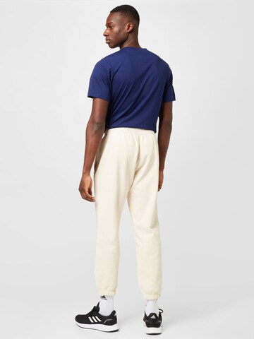 Tapered Pantaloni 'Premium Essentials' di ADIDAS ORIGINALS in bianco