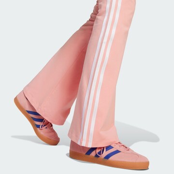 ADIDAS ORIGINALS Flared Leggings 'Adicolor' in Roze