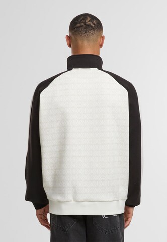 Veste de survêtement Karl Kani en blanc