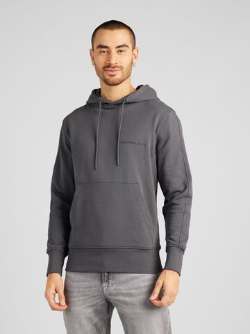 Sweat-shirt Calvin Klein Jeans en gris : devant