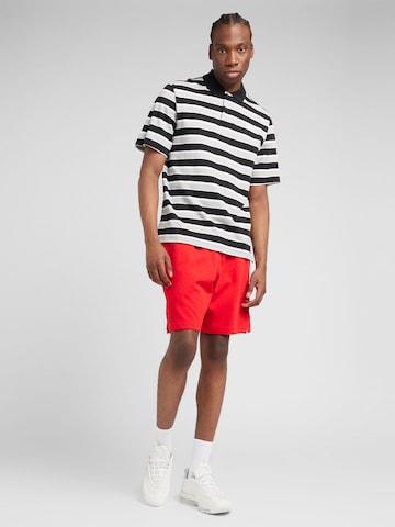 Nike Sportswear Regular Pants 'Club' in Red