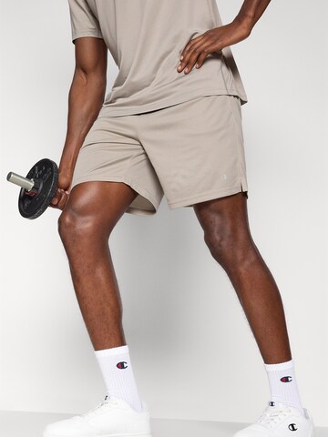 Champion Authentic Athletic Apparel Normální Funkční kalhoty – šedá