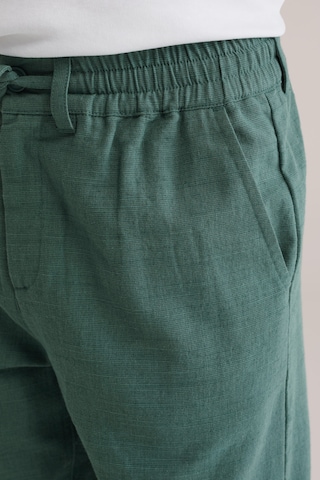 regular Pantaloni di WE Fashion in verde