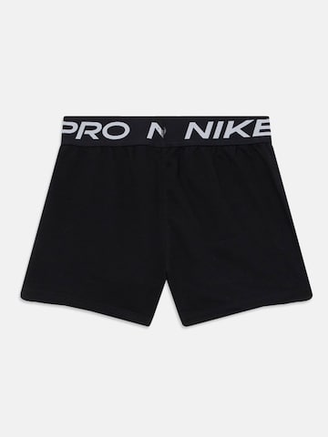 NIKE Regularen Športne hlače | črna barva