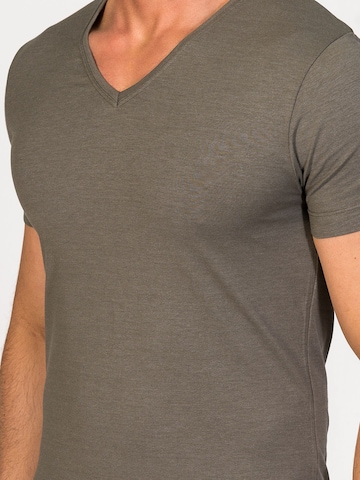 zd ZERO DEFECTS - Camiseta térmica 'V-Neck T-shirt Soya Yarn' en verde
