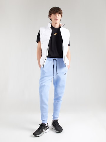 Tapered Pantaloni di Nike Sportswear in blu