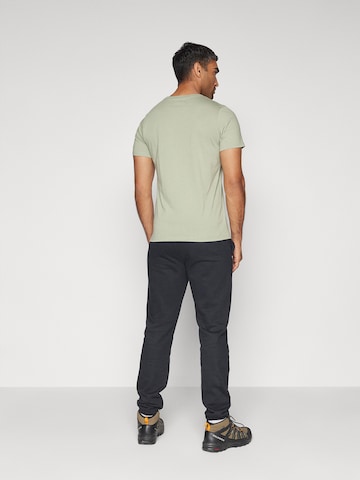 COLUMBIA Tapered Sports trousers 'Meridian Creek' in Black