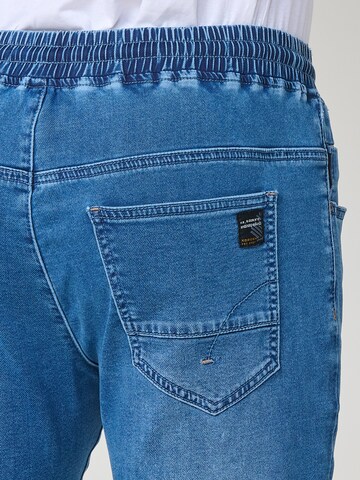 regular Jeans di KOROSHI in blu