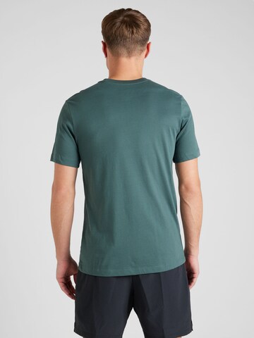 NIKE - Camiseta funcional en verde