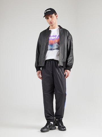 T-Shirt 'ABOVE' Nike Sportswear en blanc