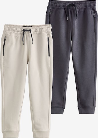 Next Tapered Housut värissä harmaa: etupuoli