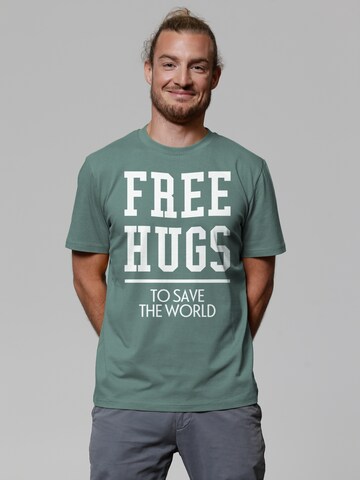 T-Shirt 'Free hugs to save the world' Watapparel en vert : devant