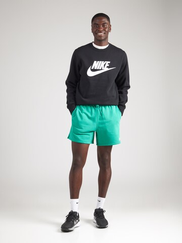 Loosefit Pantalon 'Club' Nike Sportswear en vert