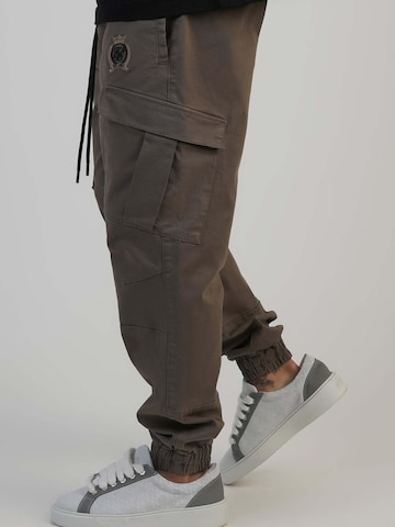 SikSilk Regular Sporthose 'Slim Fit Cargos' in Braun