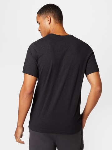 NIKE Sportshirt 'Wild Clash' in Schwarz