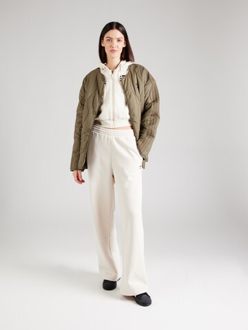 ADIDAS ORIGINALS Loose fit Trousers 'Ess' in Beige