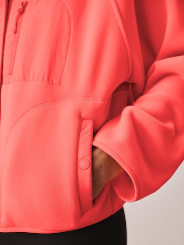 Giacca di pile di Next in rosa