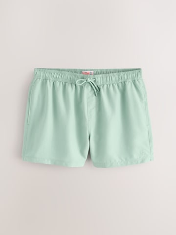 Next Uimashortsit 'Essential' värissä beige