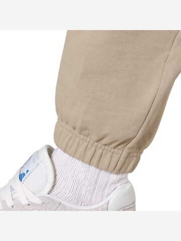 Rheinrebell Regular Sports trousers 'Jogginghose "Desert Dust"' in Beige