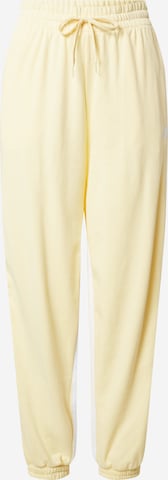 Tapered Pantaloni sportivi 'Hyperglam 3-Stripes Cuffed With Side s' di ADIDAS SPORTSWEAR in giallo: frontale