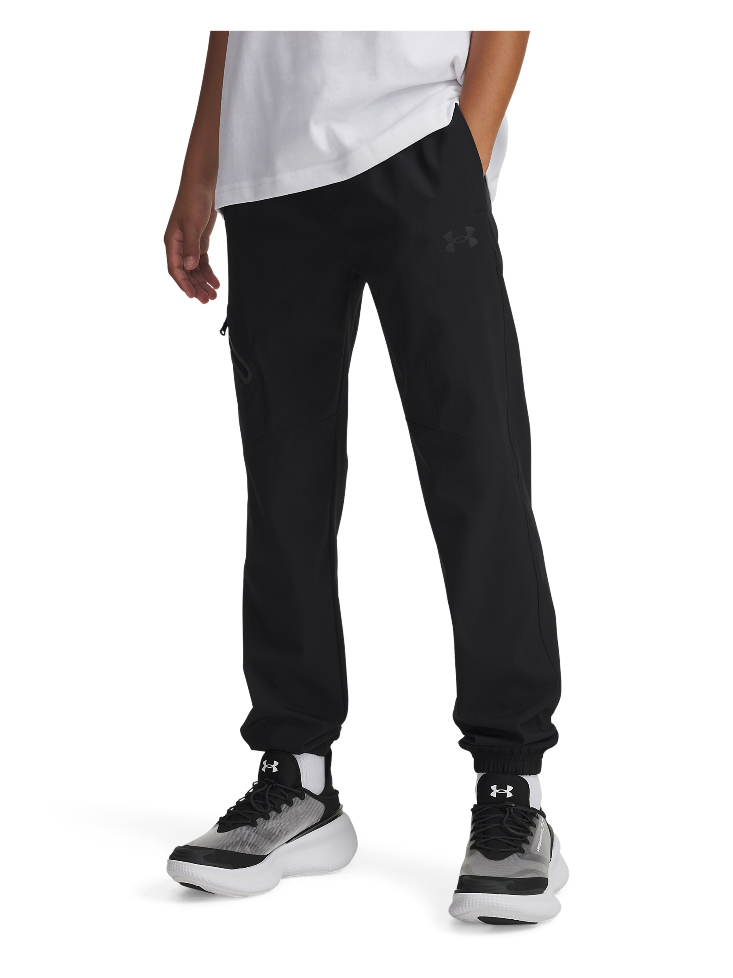 UNDER ARMOUR Tapered Workout Pants 'Unstoppable' in Black: front