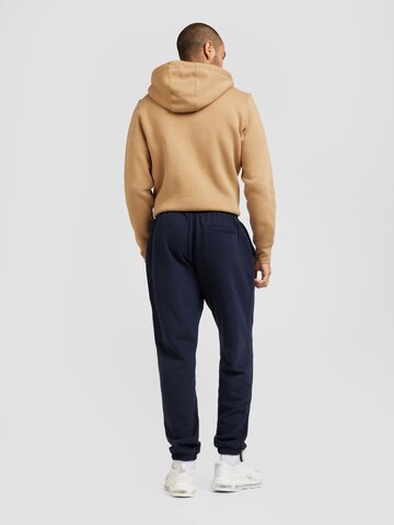 TOMMY HILFIGER Tapered Trousers 'Essential' in Blue