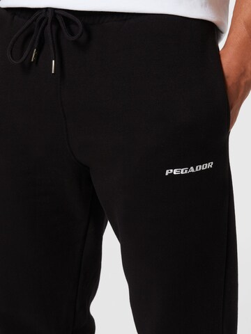 Tapered Pantaloni di Pegador in nero