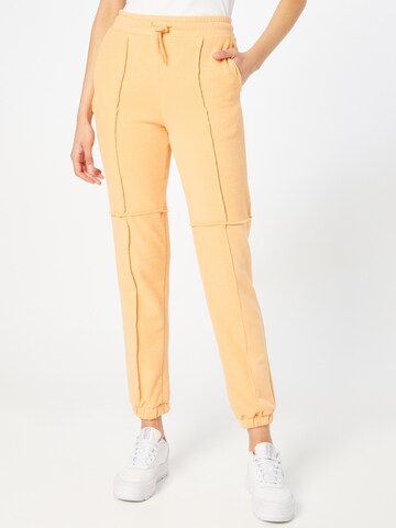 Tapered Pantaloni di Monki in arancione: frontale