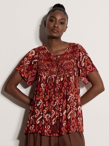 Haut ' ' Apricot en rouge : devant