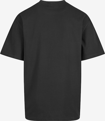 Karl Kani T-Shirt 'Splash Retro' in Schwarz