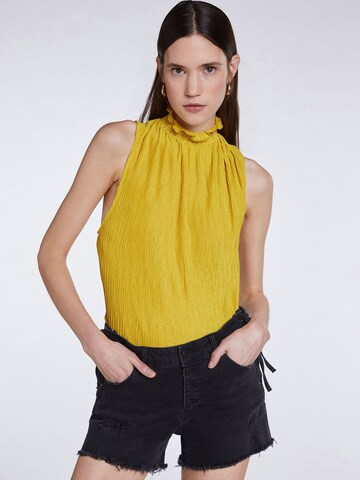 SET - Top en amarillo: frente