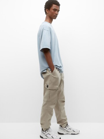 Effilé Pantalon cargo Pull&Bear en gris : devant