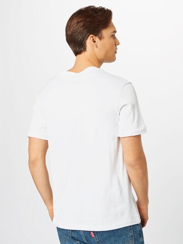 NIKE - Camiseta funcional en blanco