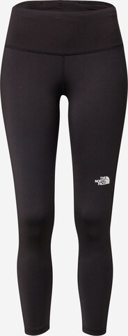 THE NORTH FACE Skinny Workout Pants in Black: front