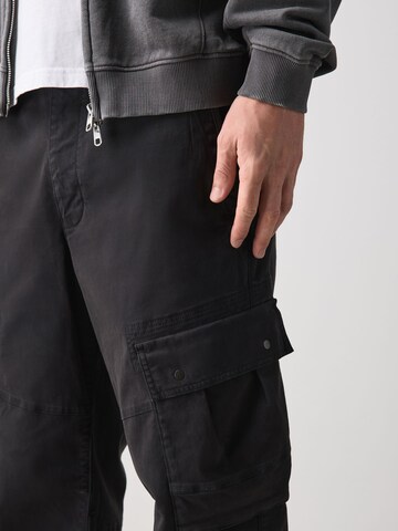 Next Tapered Cargobroek in Zwart