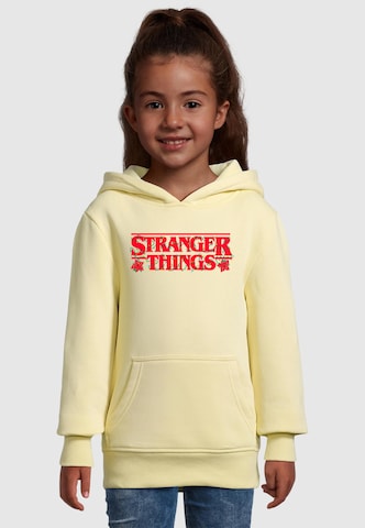ABSOLUTE CULT Sweatshirt 'Stranger Things - Christmas Logo' in Geel: voorkant