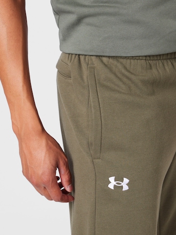 UNDER ARMOUR Tapered Sportbroek in Groen