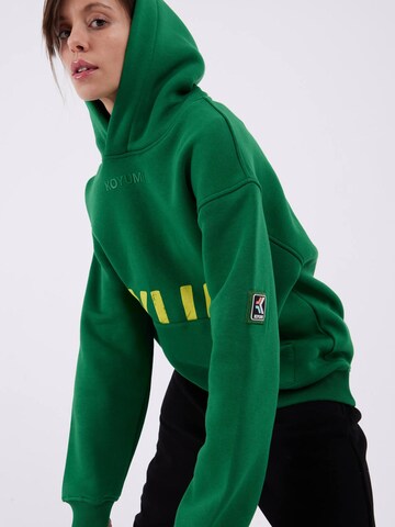 Koyumi Sweatshirt 'Unisex Oversize Hoodie – 3-Faden Stoff, innen angeraut, Suheyla Love it' in Green