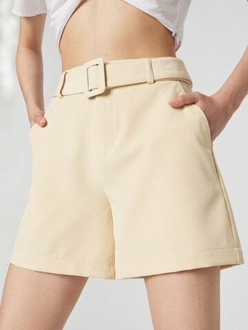 Katy Perry exclusive for ABOUT YOU Loosefit Shorts 'Nina' in Beige
