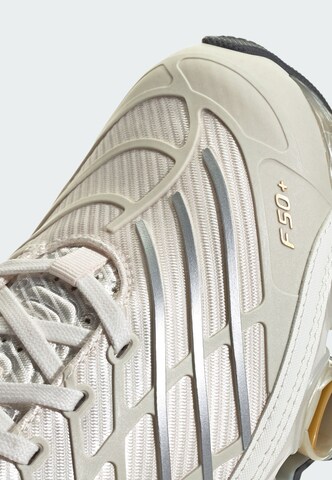 Baskets basses 'Megeride F50' ADIDAS ORIGINALS en blanc