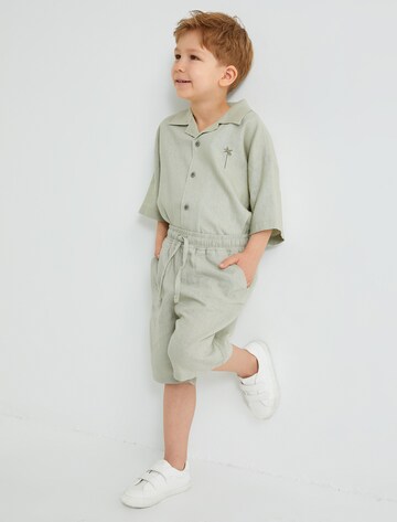 Koton Regular Trousers in Green: front
