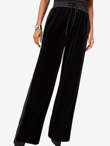 Friends Like These - Pierna ancha Pantalón en negro: frente