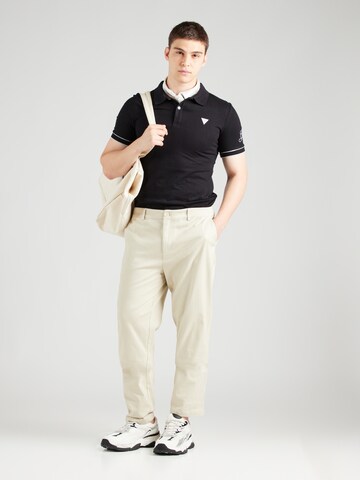 GUESS Poloshirt 'LYLE' in Schwarz
