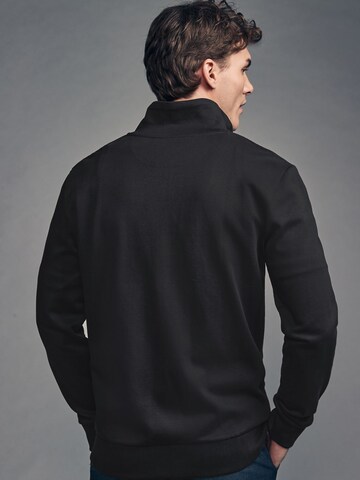 Next Sweatjacka i svart