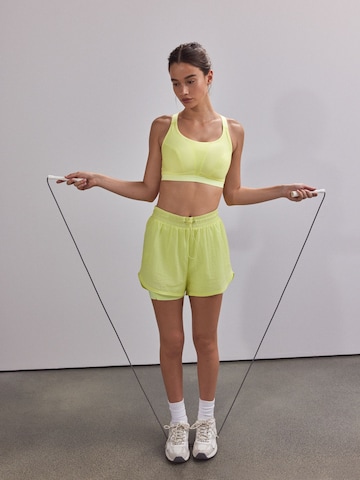 Next Bustier Sportmelltartók - sárga